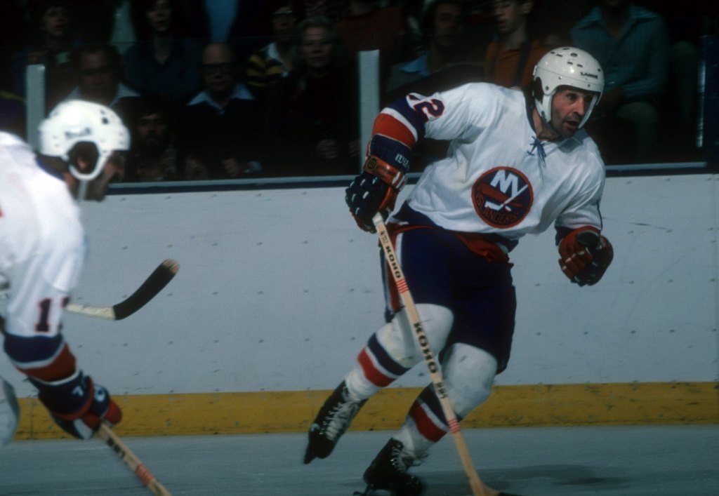 J.P. Parise #12 of the New York Islanders skates on the ice during an NHL game in December, 1978 at the Nassau Coliseum in Uniondale, New York.  