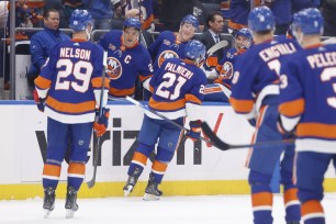 Kyle Palmieri #21 of the New York Islanders celebrates