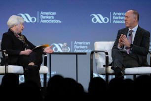 Treasury Secretary Janet Yellen speaks with American Bankers Association CEO Rob Nichols on March 21.