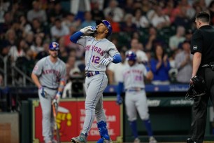 Francisco Lindor celebrates after hitting a three-run home run against the Houston Astros during the third inning.