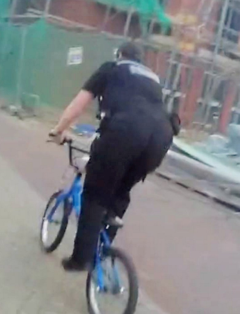 Photo of a woman riding a bike. 