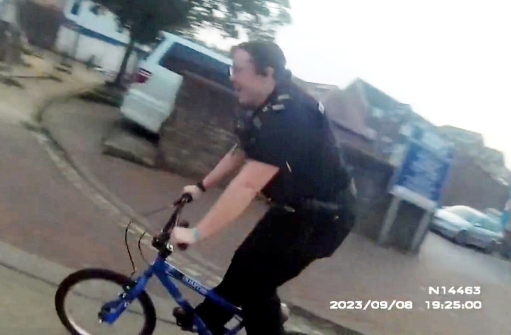 Photo of a woman on a small bike. 