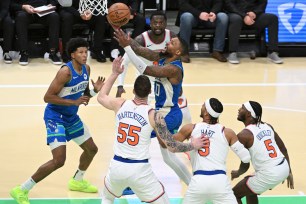 Knicks players are left watching as Damian Lillard drives to the basket for a layup attempt during their ugly 146-122 blowout loss to the Bucks in the NBA In-Season Tournament.