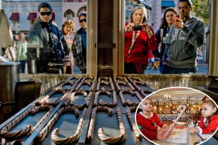 Disney fans look on at a display of candy canes