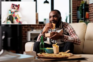 Man eating meal on couch