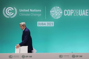 John Kerry, the Biden administration's Special Presidential Envoy for Climate, on stage at the COP28 Climate Conference in Dubai on Dec. 6, 2023.