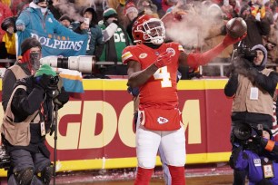 Rashee Rice celebrates after scoring a touchdown during the Chiefs' 26-17 victory over the Dolphins in their AFC wild-card game.