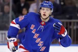 Brandon Scanlin skates with a bloody nose during his NHL debut in the Rangers' 6-5 OT playoff-clinching win over the Flyers.