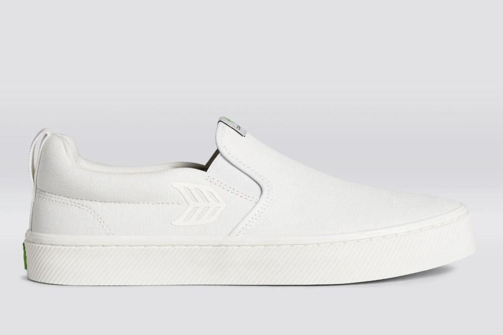 A single white canvas sneaker