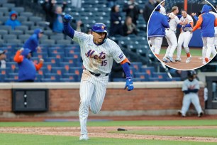 Tyrone Taylor celebrates his walk-off single that helped the Mets win their first game of 2024.