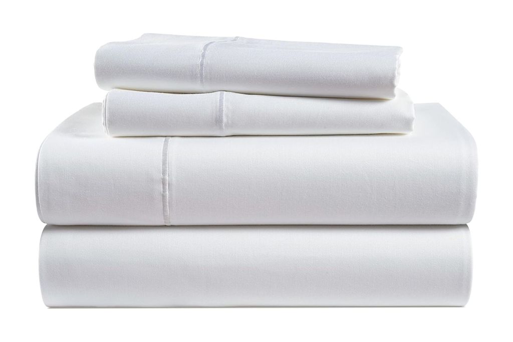 A stack of white cooling sheets