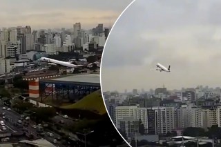 Airplane lifts off at the razor’s edge of the runway