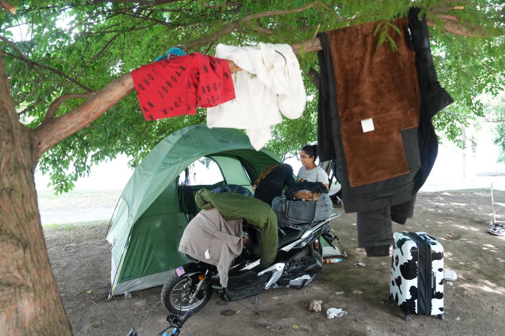 Close to 100 asylum seekers were ordered to dismantle the tents and pack up their belongings.