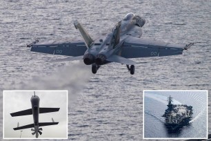 An F/A-18 Super Hornet takes off from an aircraft carrier.