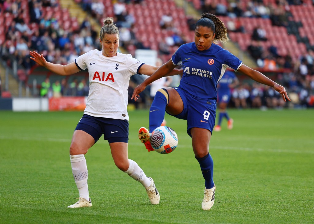 Tottenham Hotspur's Amy Turner in action with Chelsea's Catarina Macario.