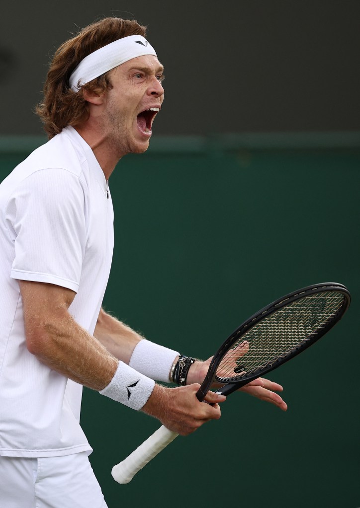 Russia's Andrey Rublev reacts against Argentina's Francisco Comesana against during their men's singles tennis match