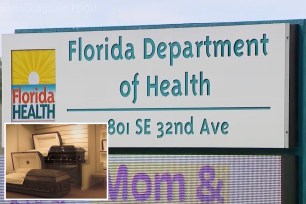 A sign for Florida Department of Health with a picture of two open coffins inset.