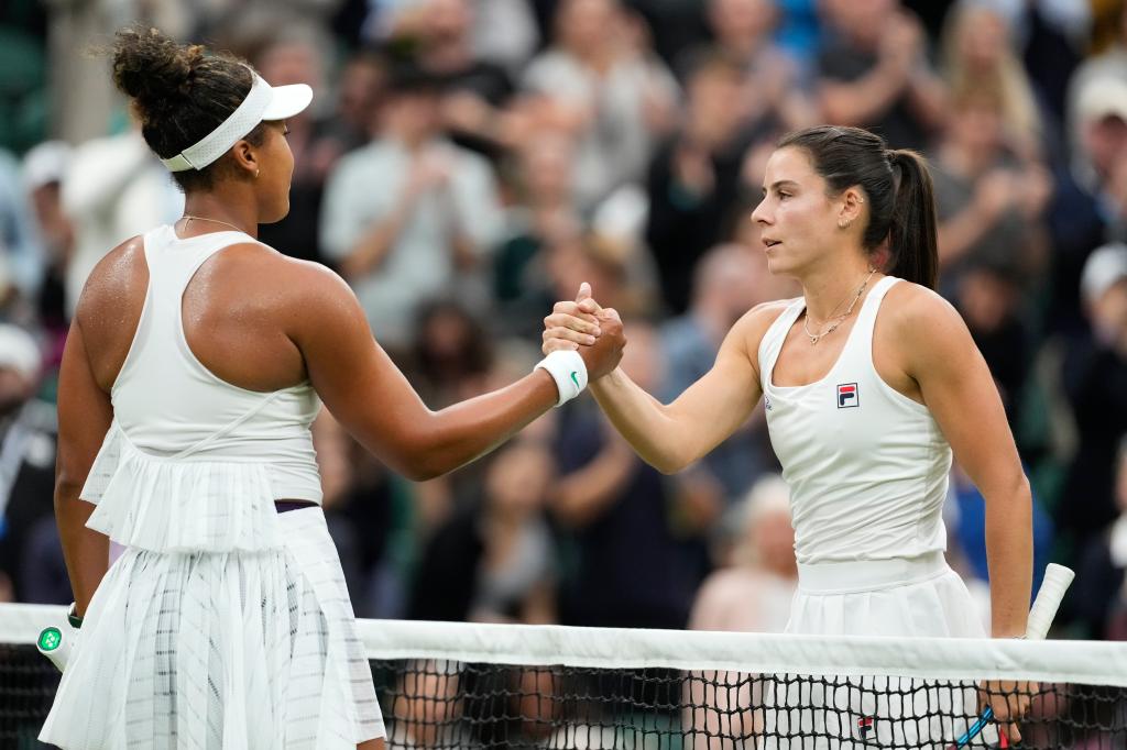 Emma Navarro, right, of the United States is congratulated by Naomi Osaka 