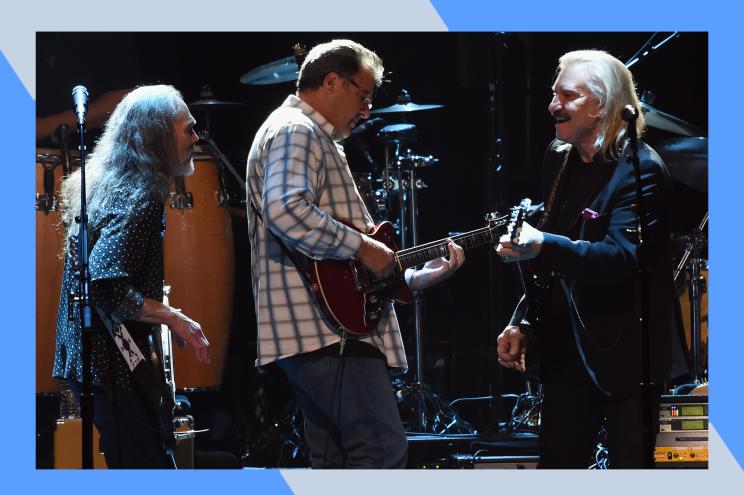 Timothy B. Schmit, Vince Gill and Joe Walsh (L_R) of the Eagles perform in concert together.