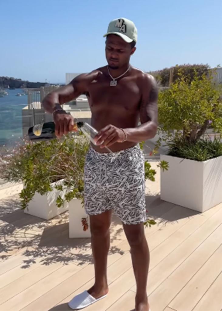 Deshaun Watson and his girlfriend Jilly Anais drinking champagne while on vacation in Spain.