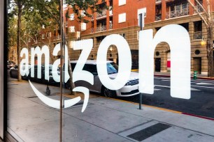 Amazon sign on the window of the Amazon Hub Locker