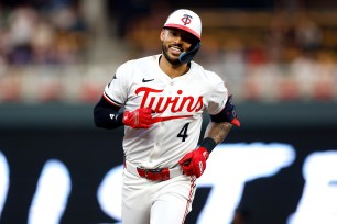 Carlos Correa #4 of the Minnesota Twins reacts as he rounds the bases on his solo home run against the Detroit Tigers in the eighth inning at Target Field on July 02, 2024 in Minneapolis, Minnesota. The Twins defeated the Tigers 5-3.