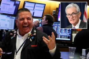 New York Stock Exchange trader and Fed Chair Jerome Powell