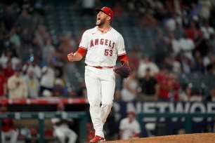 Carlos Estevez reacts after earning a save last month.