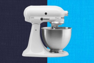 A white mixer with a bowl on a blue and white background