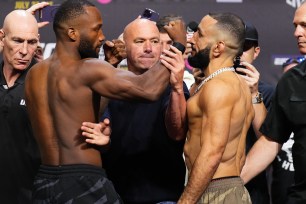 Opponents Leon Edwards of Jamaica and Belal Muhammad face off during the UFC 304 ceremonial weigh-in at Co-op Live on July 26, 2024 in Manchester, England.