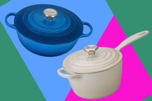 A blue and white Le Creuset pot with lid