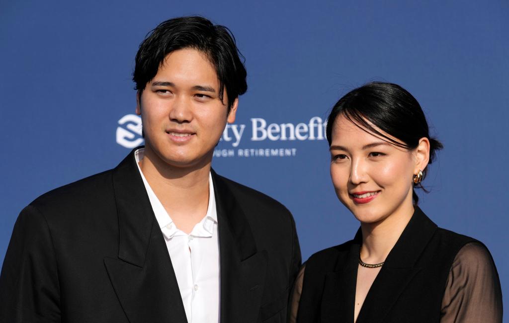 Shohei Ohtani, left, and his wife Mamiko Tanaka pose together at the Los Angeles Dodgers Foundation's 2024 Blue Diamond Gala.