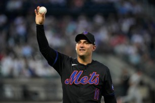 Jose Iglesias of New York Mets waving to the crowd with a ball during a game against the Washington Nationals