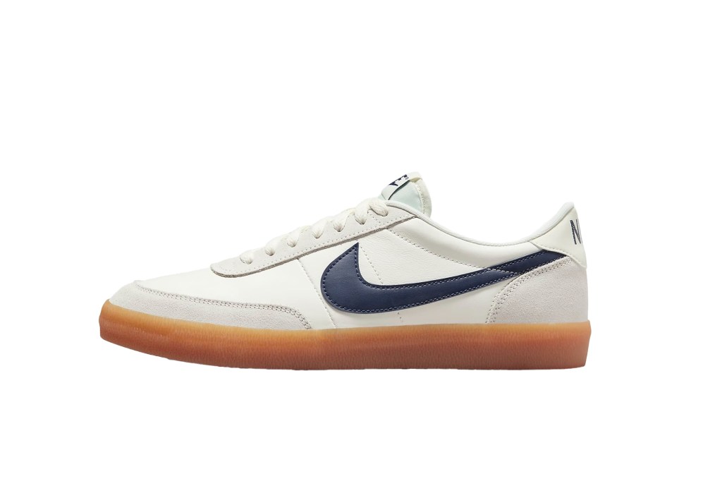 A white and blue Nike shoe