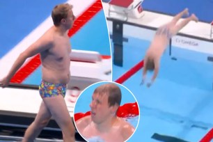 Olympics official retrieves swim cap