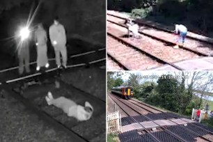 people playing on train tracks and walking on train tracks