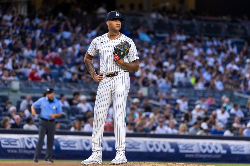 Yankees pitcher Luis Gil (81) reacts on the mound after Cincinnati Reds outfielder Will Benson (30) hits a two-run home run i