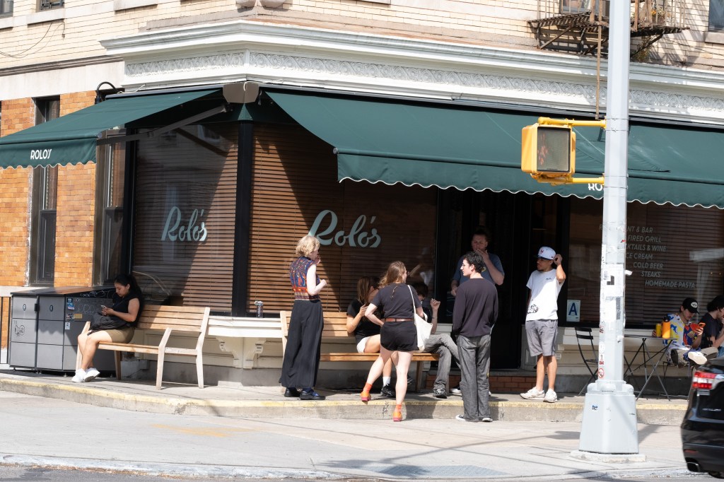 People outside Rolo's restaurant in Ridgewood.