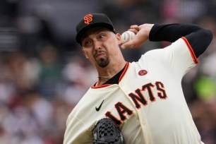 Giants left-hander Blake Snell pitching against the Rockies on July 27, 2024.