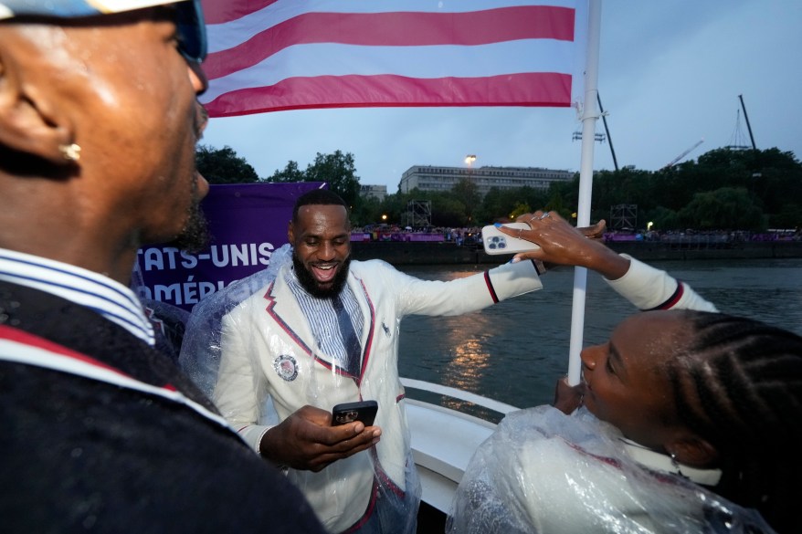 Coco Gauff and Lebron James aboard Team USA boat on the Seine.