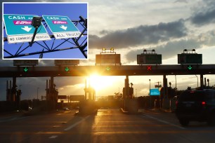 Vehicles drive through a toll plaza on the New Jersey Turnpike as the sun sets on May 11, 2021 in Newark, New Jersey