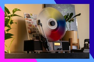 A record player on a table.