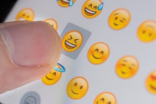 W2W6A1 Close up of someone slecting an emoji character