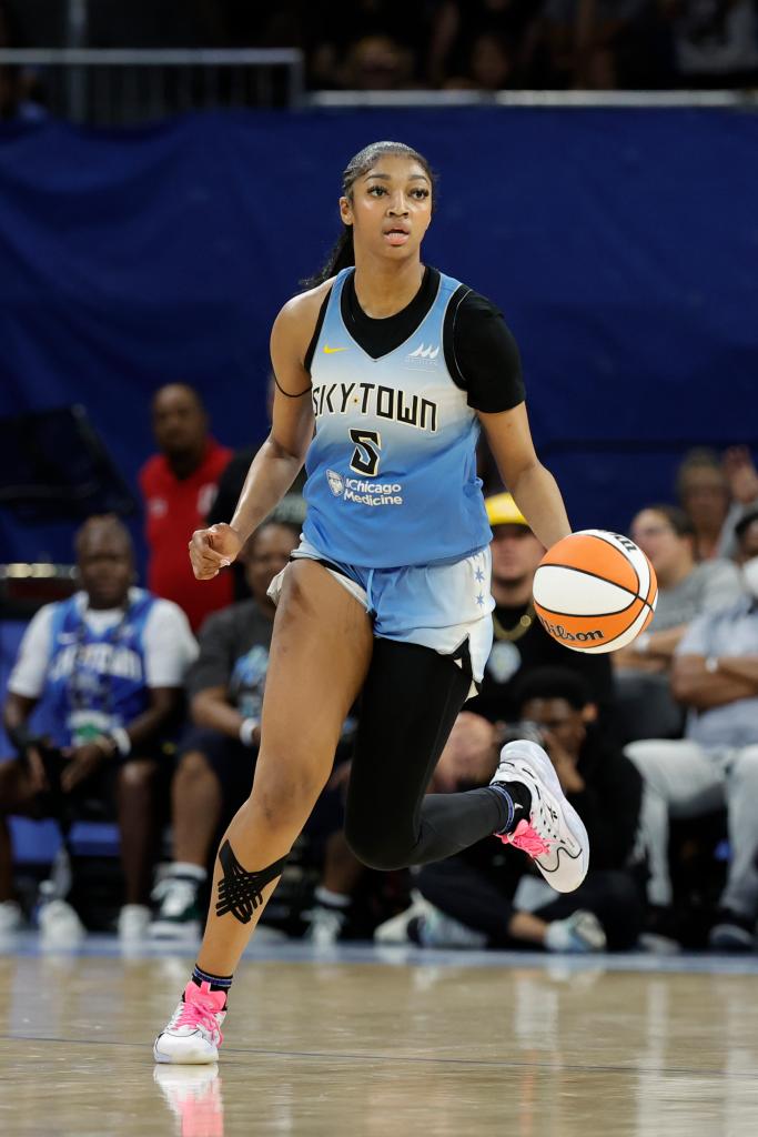 Chicago Sky forward Angel Reese (5) brings the ball up court against the New York Liberty during the second half of a WNBA game at Wintrust Arena on July 13, 2024. 