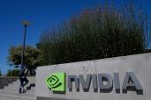 A person walks past a sign outside of a Nvidia office building in Santa Clara, California, Wednesday, Aug. 7, 2024.