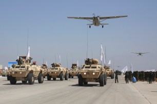 Taliban Military Vehicles are displayed during a military parade to mark the third anniversary of the withdrawal of U.S.-led troops from Afghanistan, in Bagram Air Base in the Parwan Province of Afghanistan, Wednesday, Aug. 14, 2024.