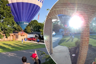 Hot air balloon narrowly misses roof, lands in Ohio neighborhood