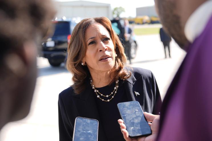 Vice President Kamala Harris addressing the media before boarding Air Force Two at Detroit Metropolitan Airport in 2024