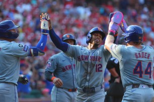 The Mets celebrate during their win over the Cardinals on Aug. 5, 2024. 