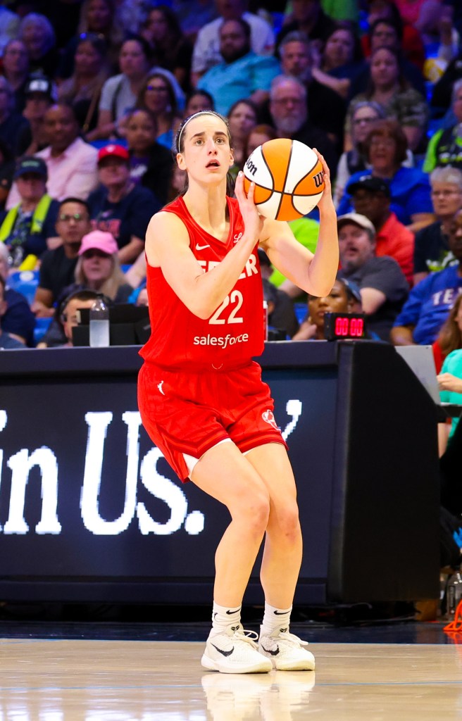 Indiana Fever guard Caitlin Clark (22) shoots during the second half against the Dallas Wings at College Park Center on July 17, 2024. 